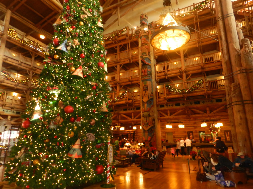 Christmas at Ft. Wilderness Lodge huge lobby with wooden beams and fireplaces