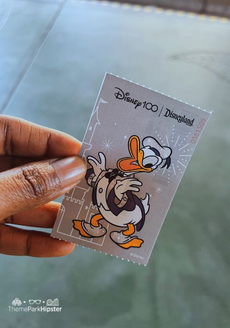 Disney 100 Disneyland Ticket with Donald Duck. Keep reading to get the best Disneyland tips for your first trip.