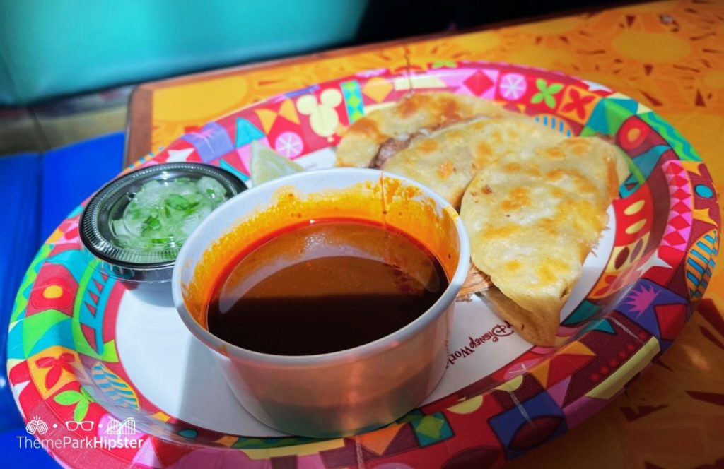 Epcot Theme Park Disney World Sunshine Seasons Quick Service Restaurant in the Land Pavilion Birria Tacos. One of the best restaurants at Walt Disney World.