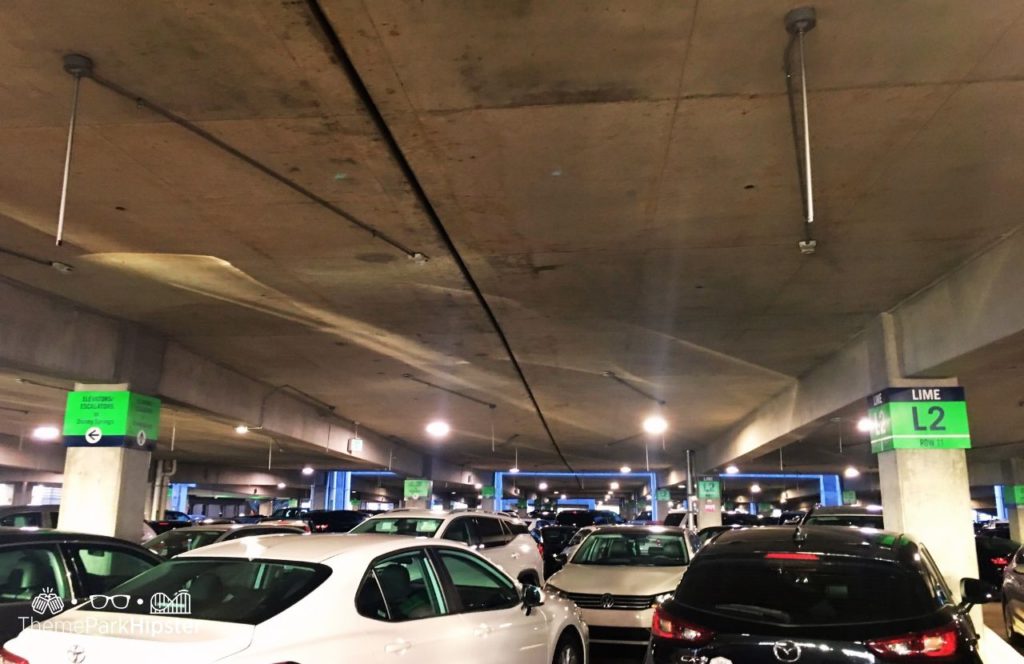 Walt Disney World Disney Springs Parking Lime Garage. Keep reading to find out more about Disney Springs parking.