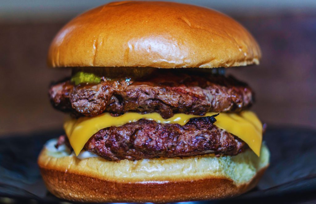 Hamburger with cheese at Blacktap Craft Burgers at Disneyland. One of the best restaurants in Downtown Disney Anaheim