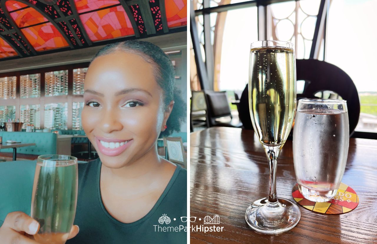 NikkyJ enjoying sparkling white wine Toledo Restaurant at Disney's Coronado Springs Resort. One of the best restaurants at Disney World for adults.