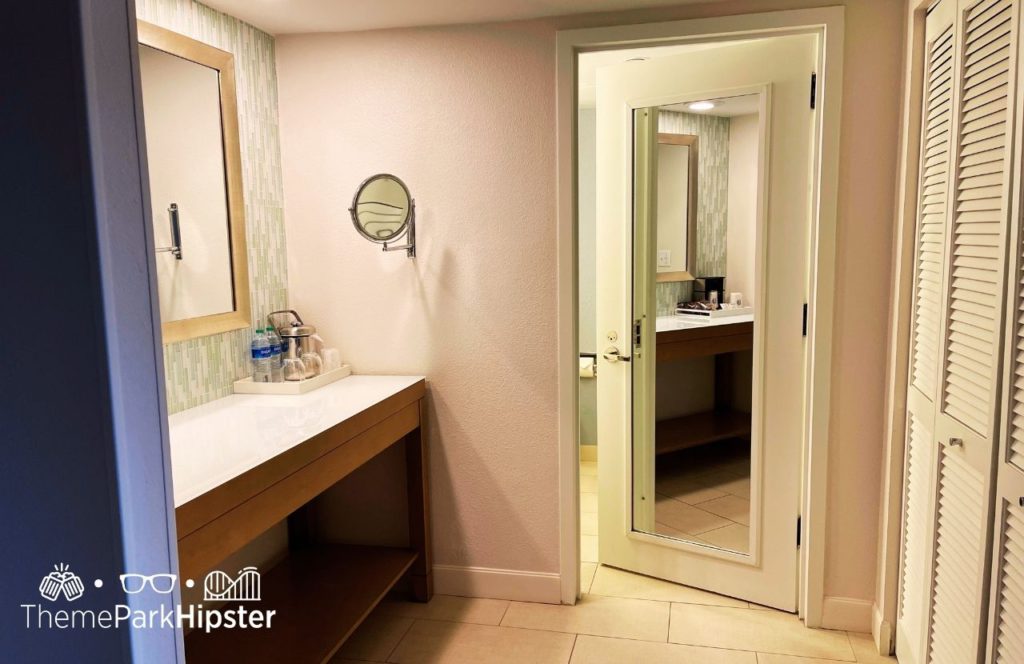 Queen room bathroom Swan and Dolphin Resort Hotel at Walt Disney World. Keep reading to learn more about Swan and Dolphin Resort Hotel at Disney.