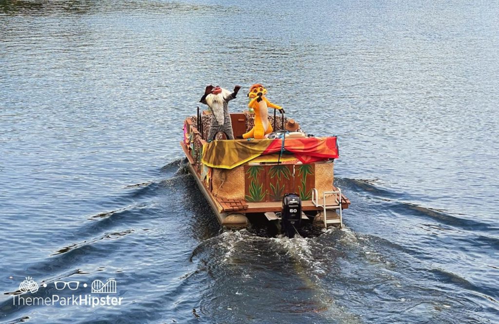 Rafiki and Timon Character on Water Cavalcade Parade Disney Animal Kingdom Theme Park. Keep reading to get the full guide to Disney Animal Kingdom for adults.