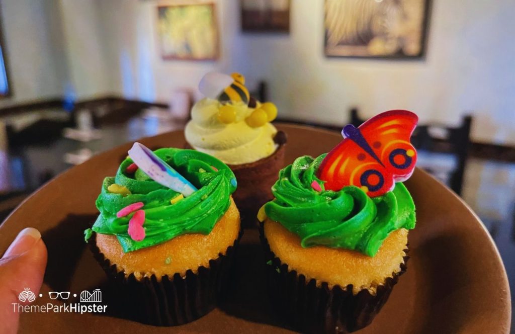 Tusker House Restaurant Buffet Food cupcake dessert Disney Animal Kingdom Theme Park. Keep reading the get the worst and best snacks at Disney World.