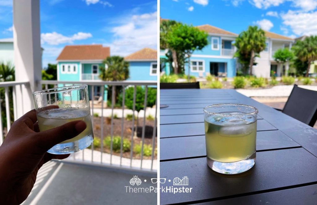 Enjoying a margarita on the balcony at Margaritaville Resort Orlando Hotel. Keep reading to find out more about a vacation at Margaritaville Orlando Resort Hotel.